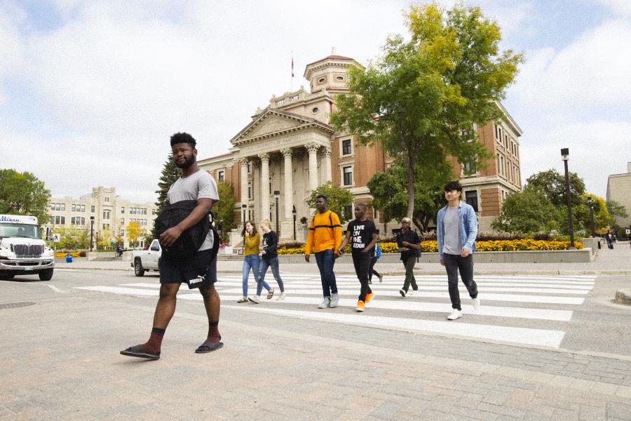 An image of students walking outside the Admin Building on UM's Fort Garry Campus.